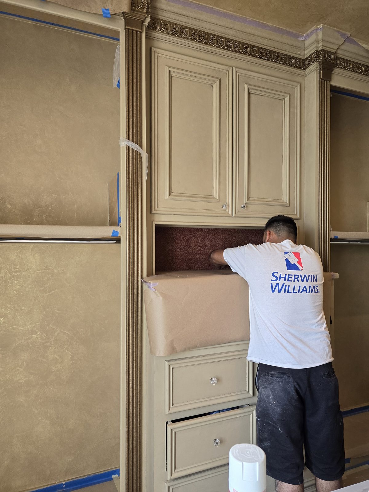 Off The Wall painter applying a custom interior finish