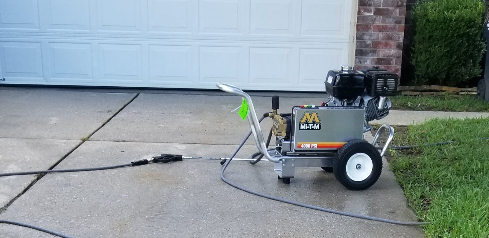 Off The Wall pressure washing an exterior surface